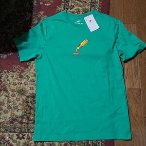Nike Men's Green Tee with Graphic Design